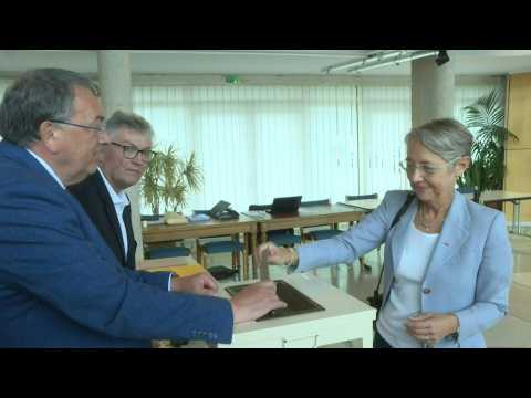 French PM Elisabeth Borne casts ballots for legislative elections