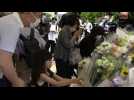 Mourners in Japan place flowers for Abe at scene where ex-PM killed