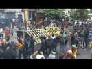 Protesters break down barricades near presidential residence in Colombo as Sri Lanka leader flees