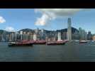 Boats parade in Hong Kong harbour ahead of 25th handover anniversary
