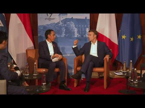 French President Emmanuel Macron meets Indonesian President Joko Widodo during G7 summit in Germany
