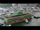 AERIAL SHOTS of Famed Hong Kong floating restaurant being towed away