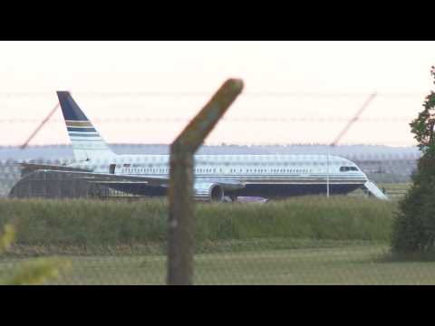 People board plane which is to take UK asylum seekers to Rwanda