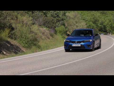 2022 Honda Civic e:HEV in Blue Driving Video