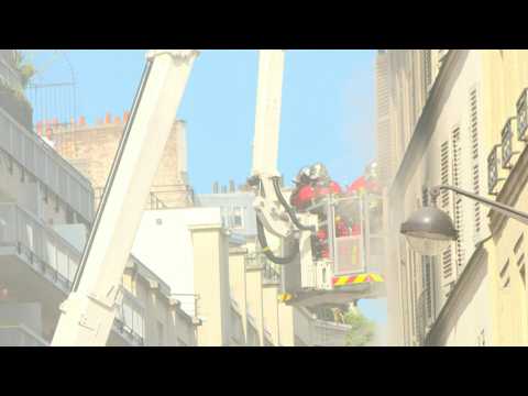 Firefighters tackle apartment blaze in Paris, nine injured