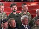 Sean Penn et Bono de U2 avec des militaires ukrainiens