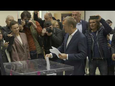 Donald Tusk votes in Poland's parliamentary elections