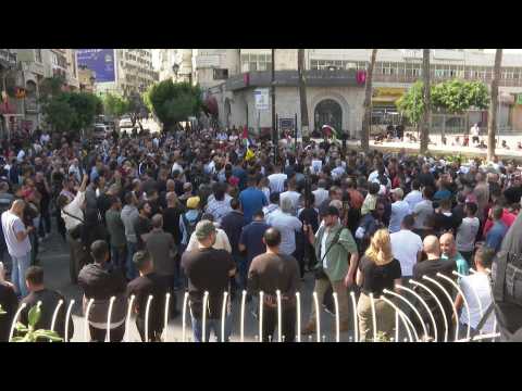 Hundreds march in Ramallah after Gaza hospital strike