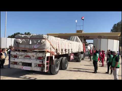 Humanitarian aid starts entering Gaza crossing from Egypt