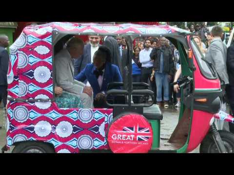 UK Royals pose in a tuk tuk after visiting historic Kenya monument on last day of state visit