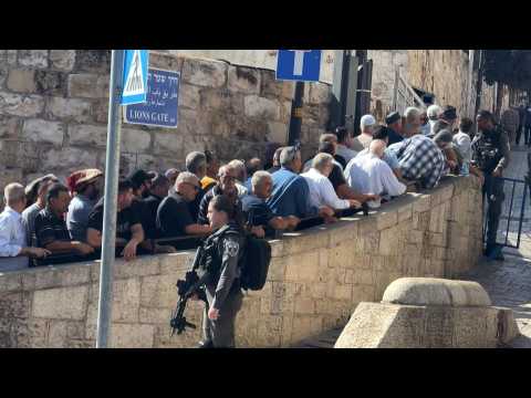 Muslims queue for Friday prayers in Jerusalem's Al-Aqsa mosque