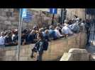 Muslims queue for Friday prayers in Jerusalem's Al-Aqsa mosque
