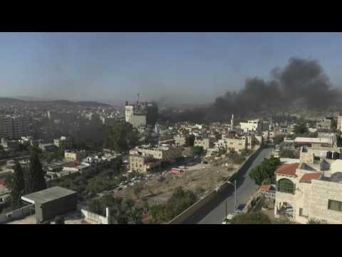 Heavy smoke, gunfire at scene of deadly Israeli raid on Jenin