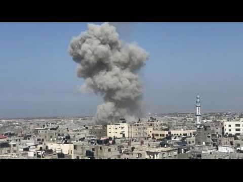 Images of smoke rising after air strike hits Rafah in southern part of Gaza Strip