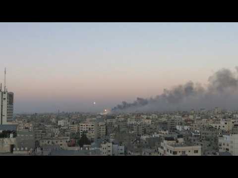 Flares and explosions over Gaza City sky