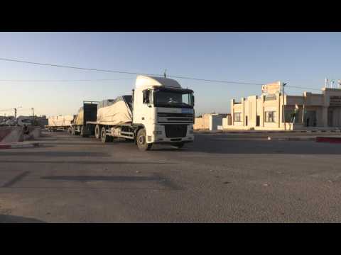 Images show aid trucks entering city of Rafah in southern Gaza Strip