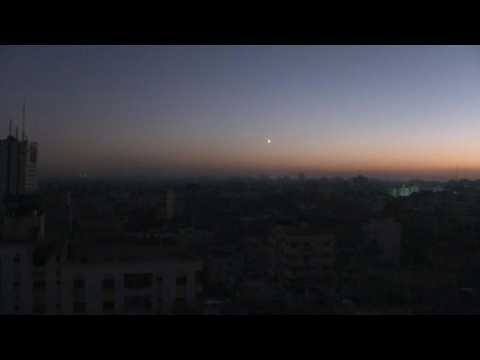 Flares fall, smoke rises over Gaza City