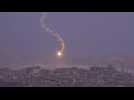 Flares fall over Gaza as sun rises