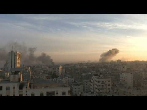 Heavy gunfire heard and smoke billows over Gaza City