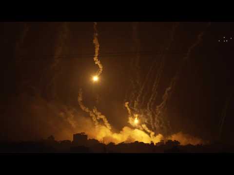 Flares and projectiles light up night sky over northern Gaza
