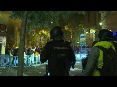 Far-right protesters against Catalan amnesty deal throw flares at police
