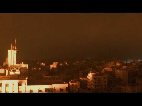 Airstrikes rock, light up Gaza City sky