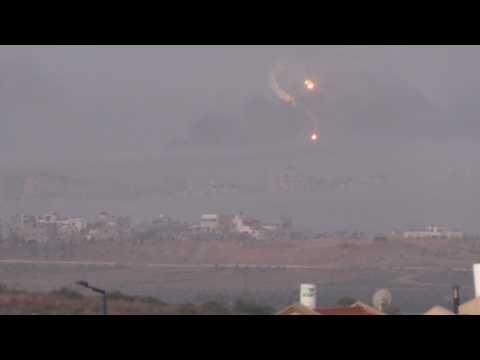 Flares and smoke billows from the northern Gaza Strip before truce