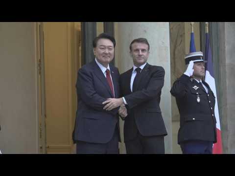 French President Macron greets South Korean counterpart Yoon in Paris