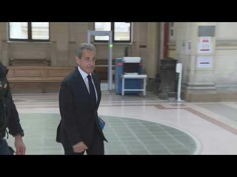 Former French President Sarkozy arrives for cross-examination at appeal trial in Paris