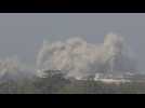 Heavy smoke billows as strikes hit Gaza, seen from Israel