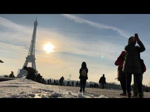 Snow surrounds Paris' Eiffel Tower