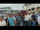 People attend funeral of prosecutor killed in Ecuador