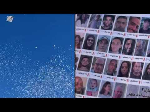 Israeli army drops leaflets in Rafah bearing portraits of hostages