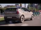 Volvo EX30 in Vapour Grey Driving in the city
