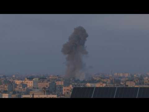 Plume of smoke after airstrike north of Rafah