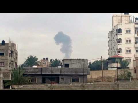 Smoke rises following a strike in Gaza's Deir al-Balah