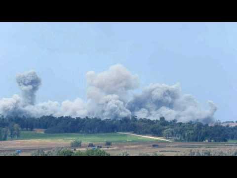 Smoke billows from central Gaza amid the ongoing Israel-Hamas conflict