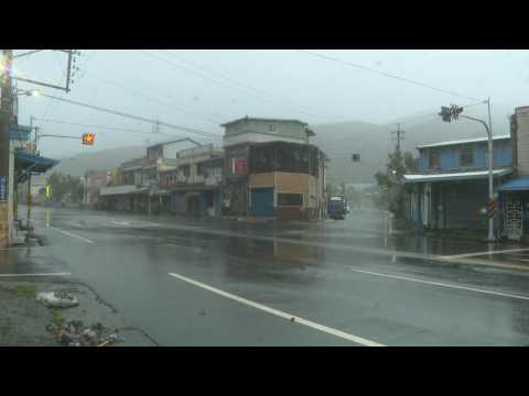 Strong winds and rain batter southern Taiwan as Typhoon Koinu nears