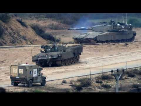 Israeli military vehicles manoeuver near near the Gaza border