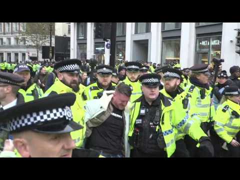 EDL founder Tommy Robinson arrested at anti-Semtism march in London
