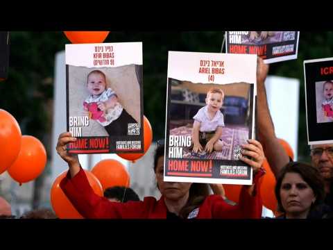 Relatives of infant hostage call for his release during protest in Tel Aviv