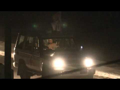 Released hostages seen aboard Red Cross convoy driving through Rafah crossing