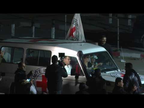 Red Cross convoy carrying released hostages crosses Rafah border to Egypt