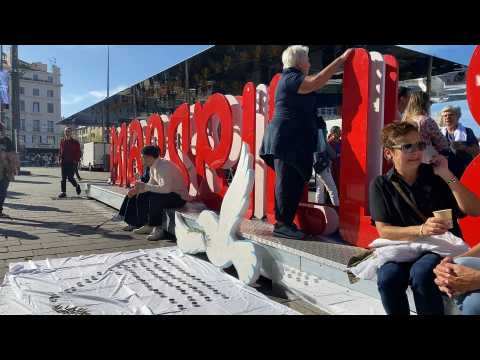 Peace rally and white flags in old port of Marseille