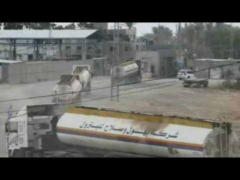 Tank trucks head to UN fuel depot for loading at Rafah crossing