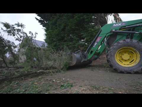 Storm Ciaran: tractor clears debris on France's western coast