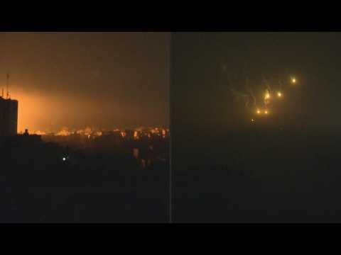 Night strike rocks Gaza City as Israeli flares fill the sky
