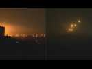 Night strike rocks Gaza City as Israeli flares fill the sky