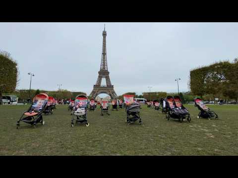 Empty pushchairs at Eiffel Tower to demand release of child hostages