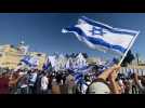 Pre-military age Israeli youth gather at the Western Wall in support of Israel